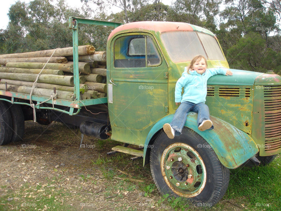 girl old truck logs by rickie947