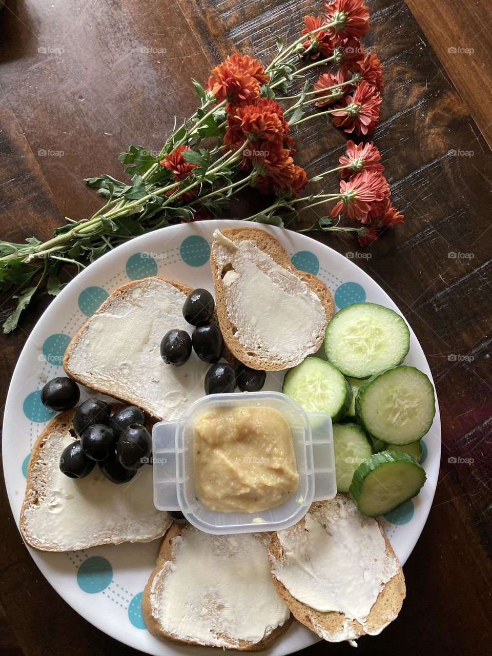 Lunch platter with homemade hummus and mums