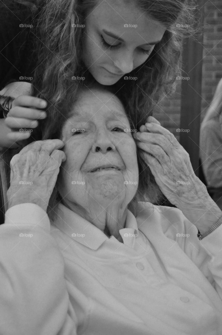Granddaughter loving her grandmother