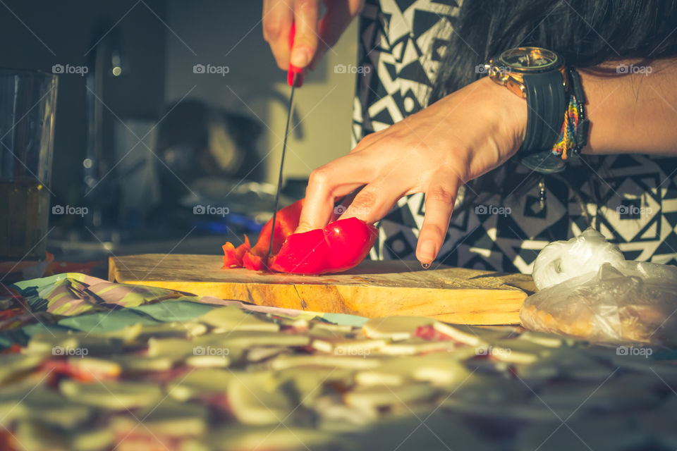 Woman cutting vegetables