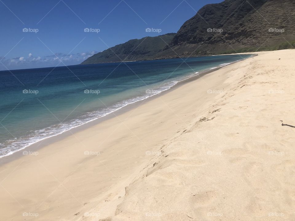 Awesome beach stretched across the north shore!!! Wonderful mountains and desolate waste side 