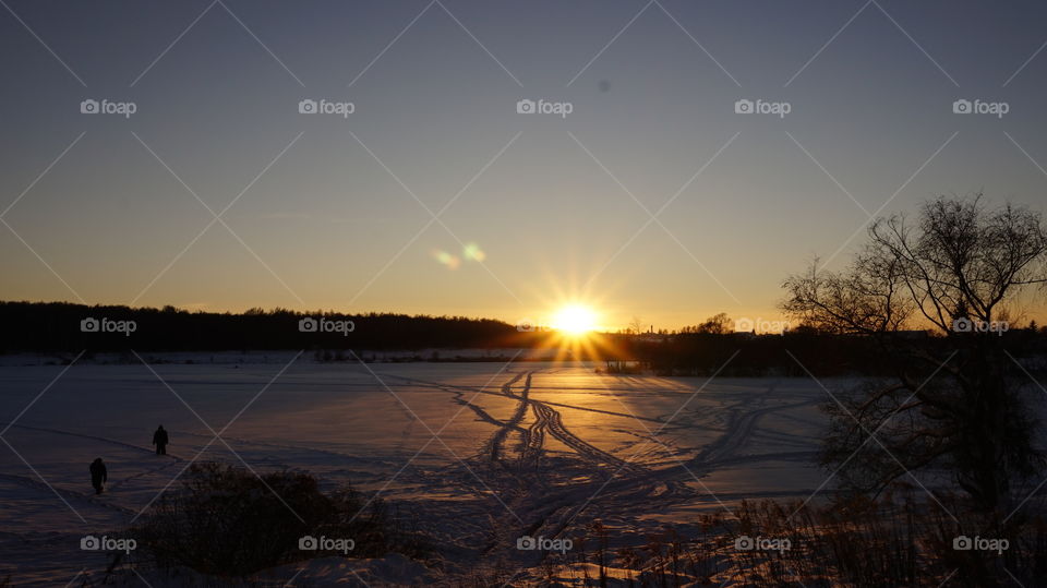 Sunset at snowy landscape