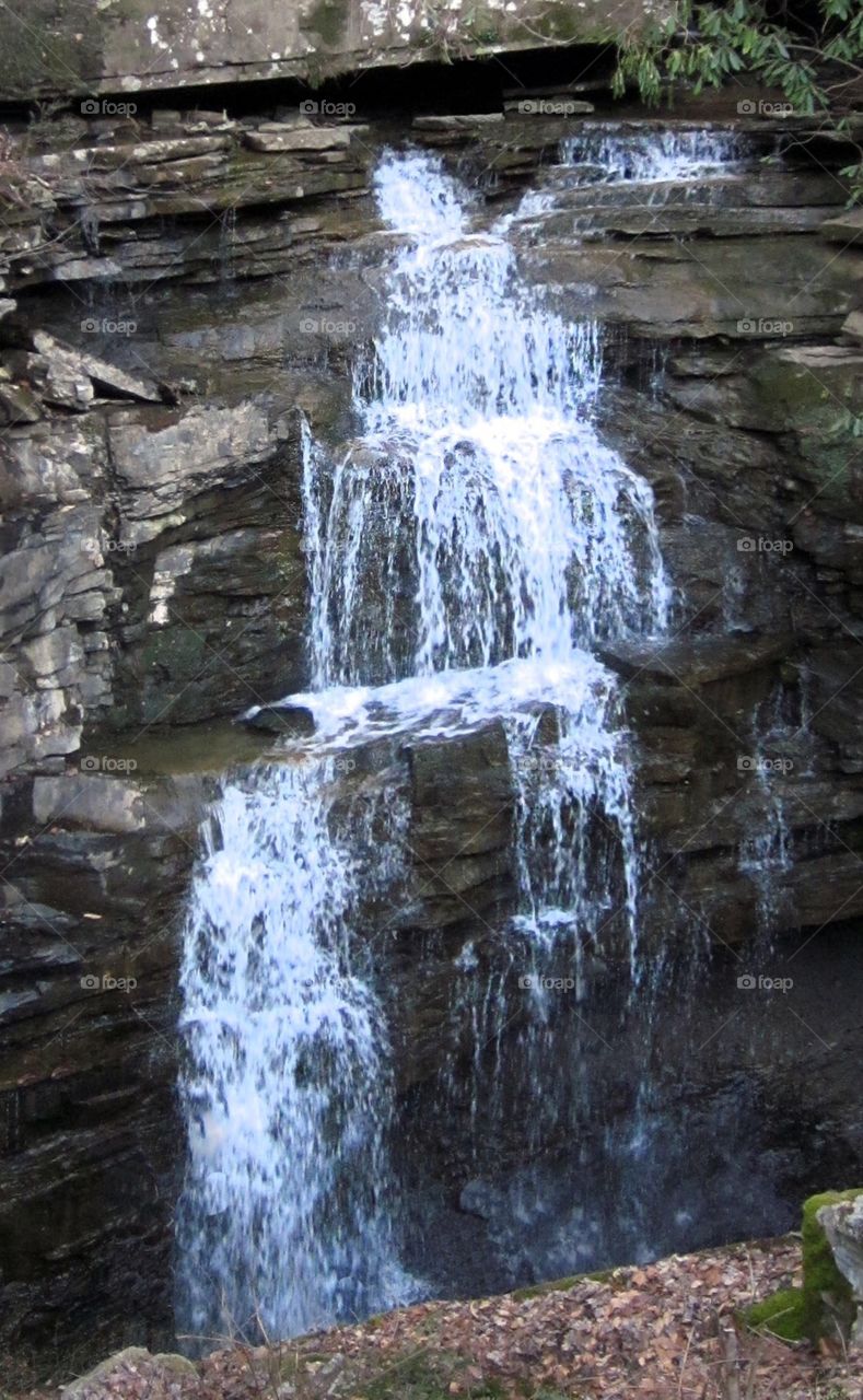 Painted Waterfall. A beautiful shot of a small waterfall spotted on a hiking trip.