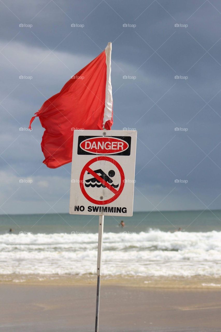 Warning sign on beach