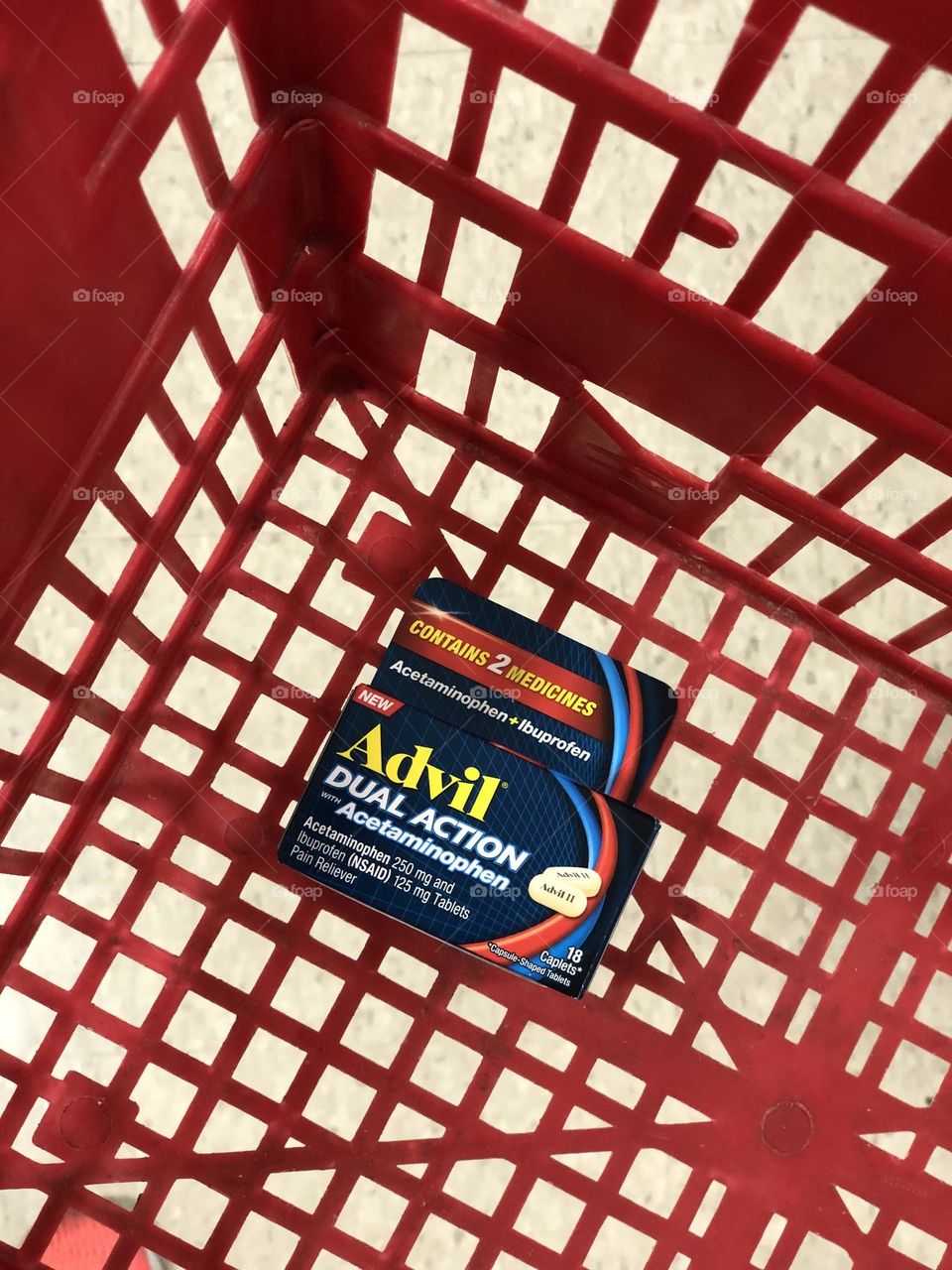 Shopping in the store, daily activities, shopping for Advil Dual Action medicine, medicine for pain 