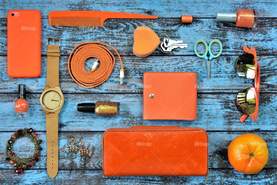 Variety of orange color things  that necessary for every day 