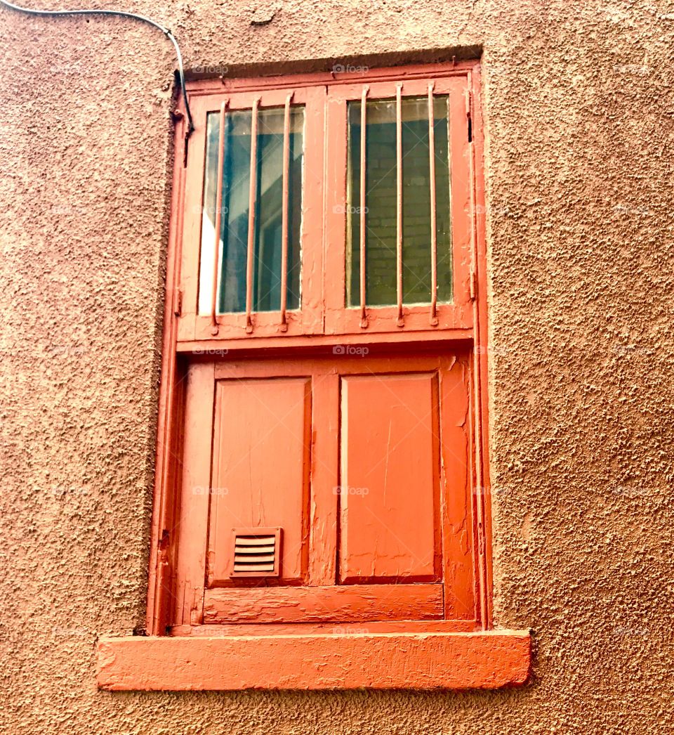 Orange window covering