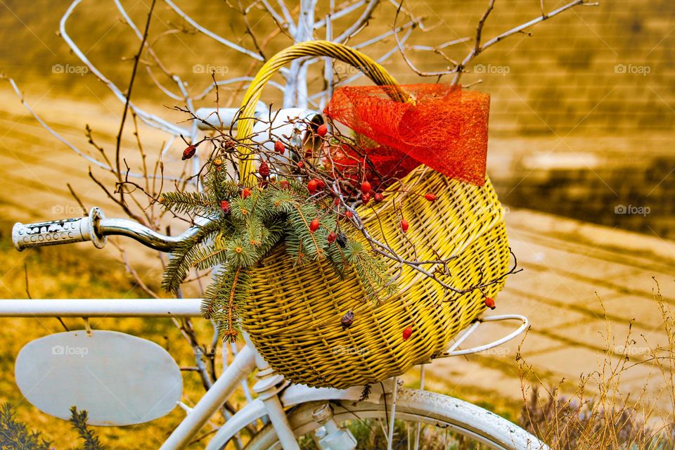 A yellow bike basket