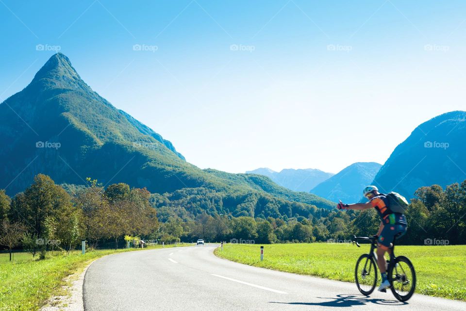 Bicycle Rider Enjoys Sunny Day While Bicycling