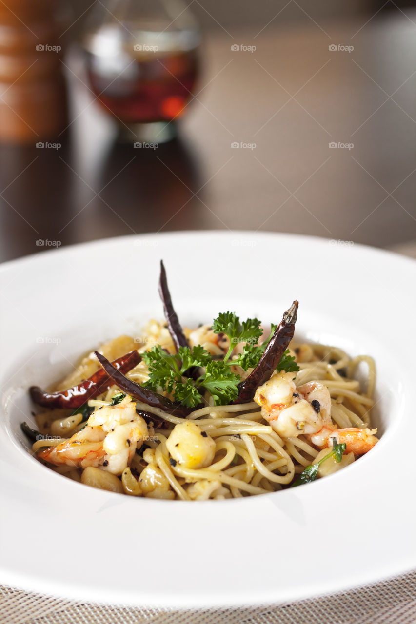 Spagetti in seafood with chilli and garlic