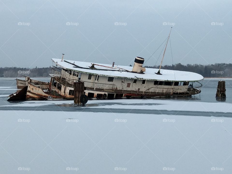 Sinked boat, snow covered, Kalsro, Norrköping, Sweden