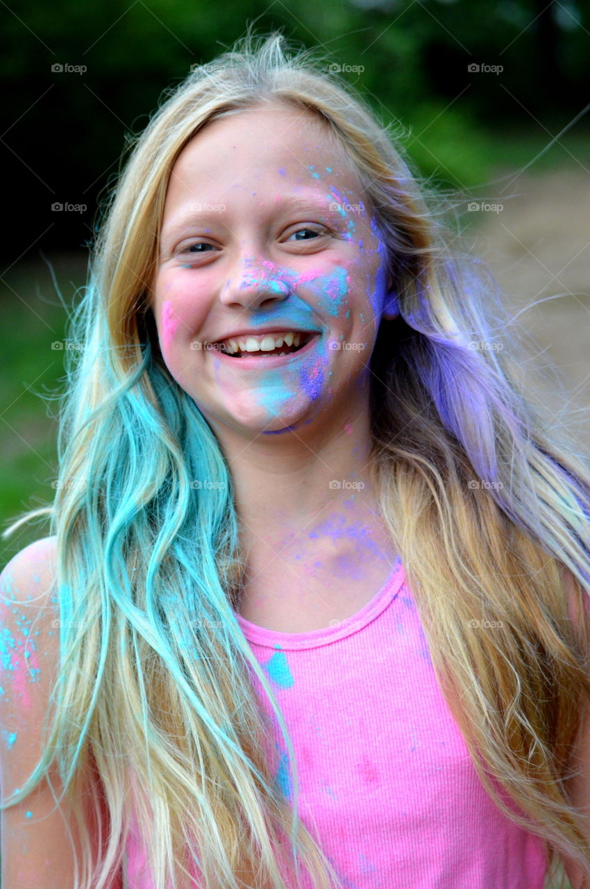 Happy girl with painted face