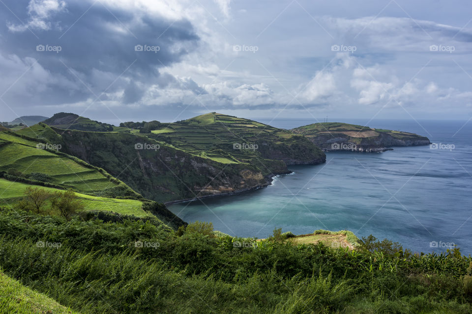 A panoramic view from the Miradouro of Santa Iris on the coast of the island of Sao Miguel, Azores, Portugal.