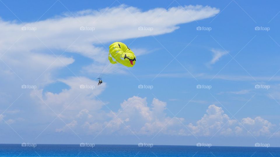 Parachute sailing on a beach