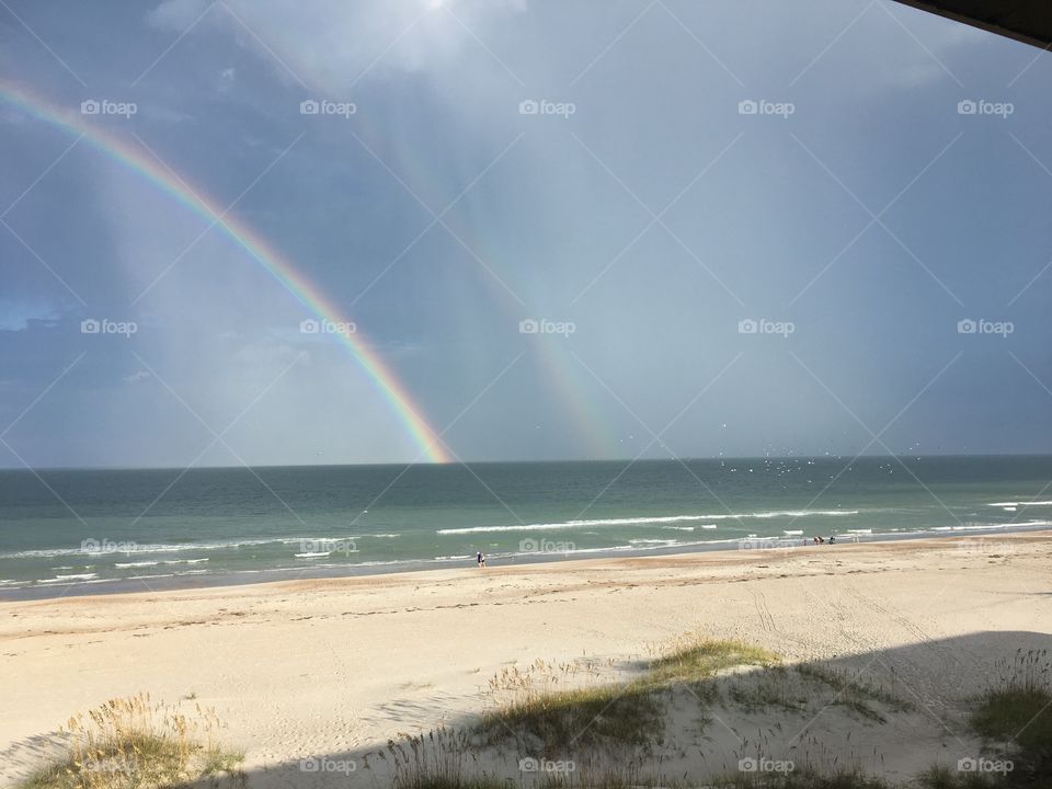 Rainbow over ocean 