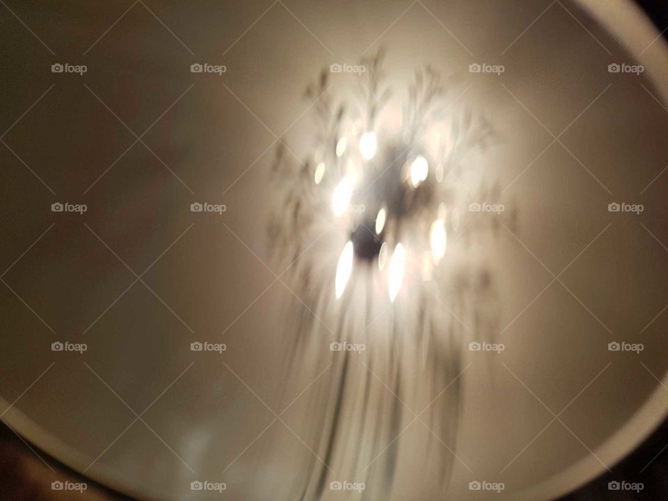 Playing with light, reflection of a ceiling light through a mirror.