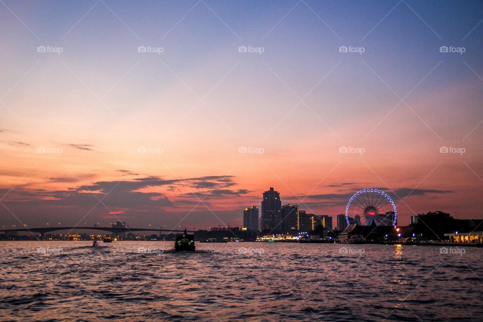 The night view of the harbor at the beginning of the lanterns at sun set