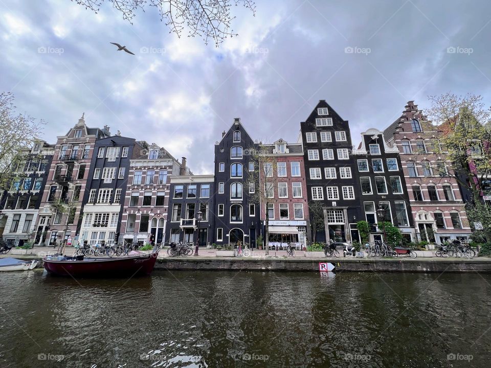 Old hansa style buildings on the river water canal bank