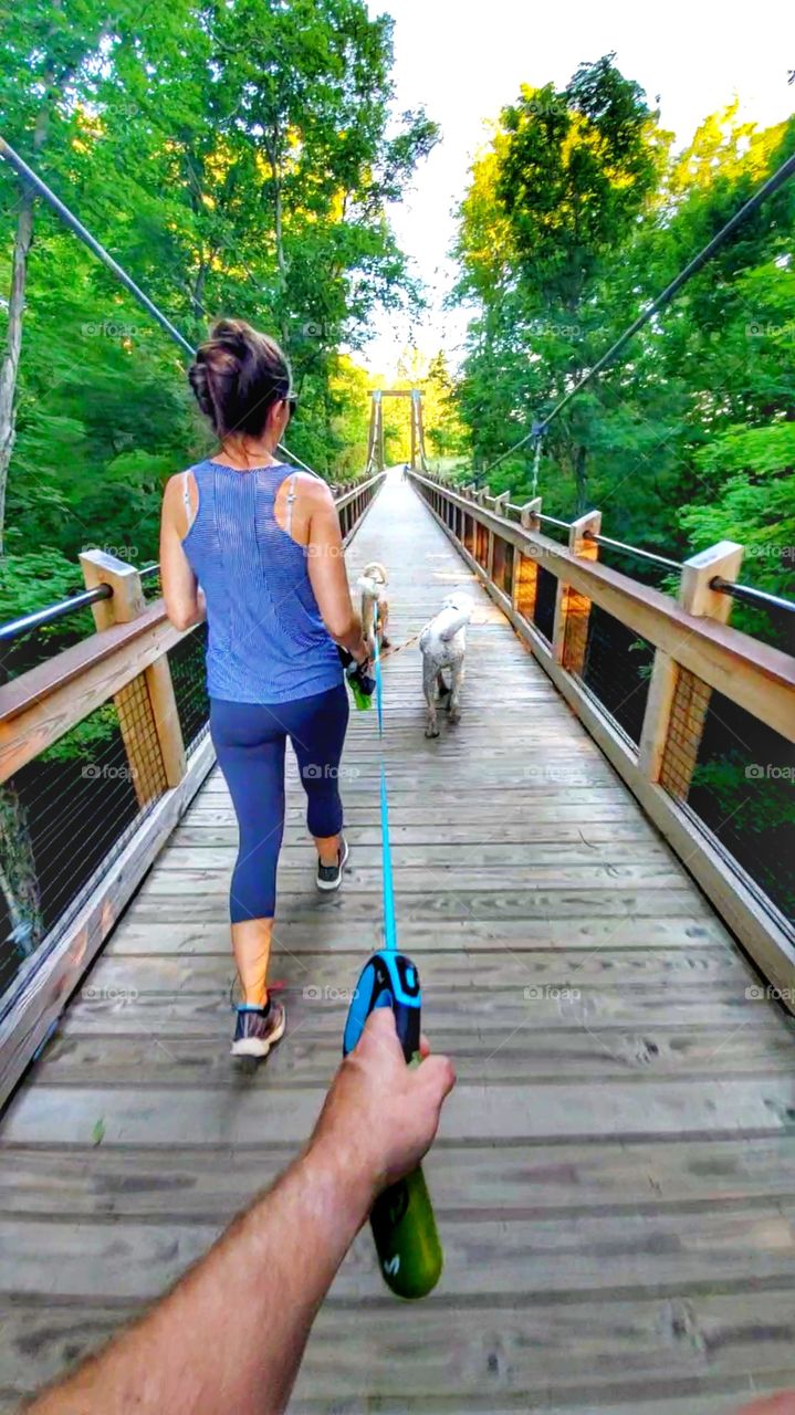 walking the dog on suspension bridge