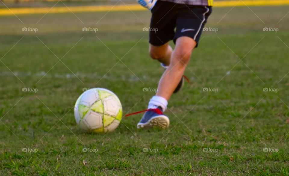 Boy playing soccer