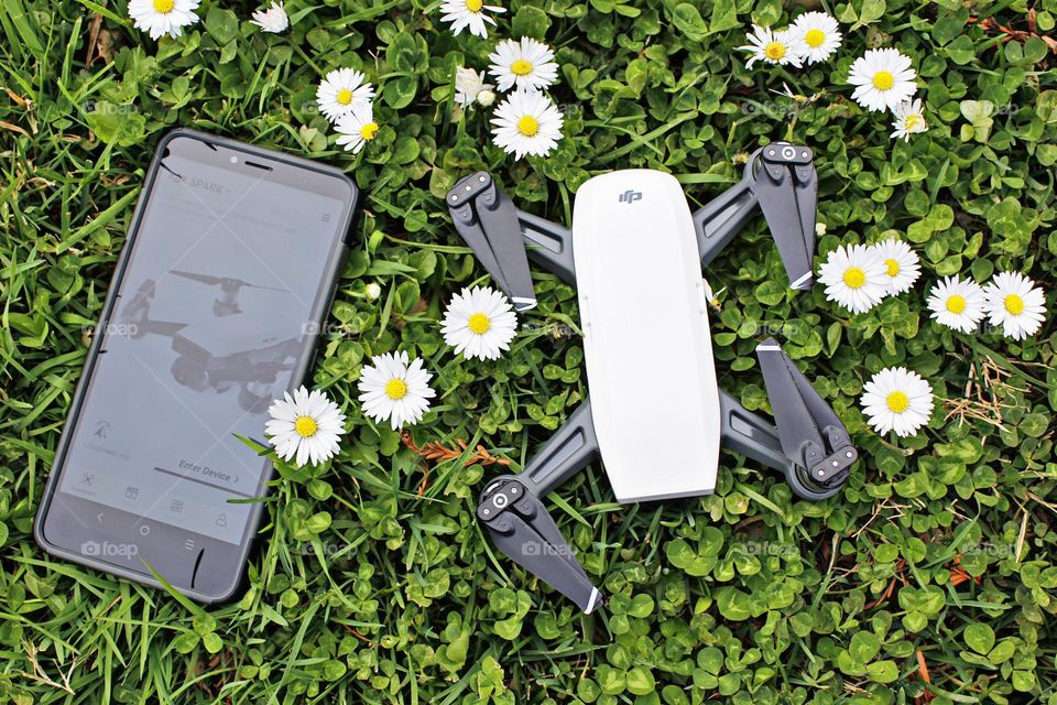Rectangle drone photography play in a field of wild flowers