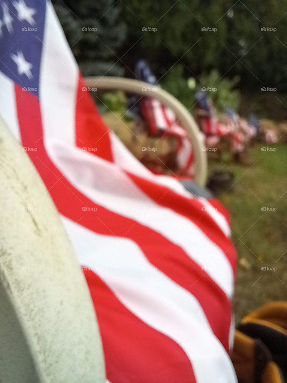 we pay tribute, 13 chairs, 13 pair of boots, 13 flags.