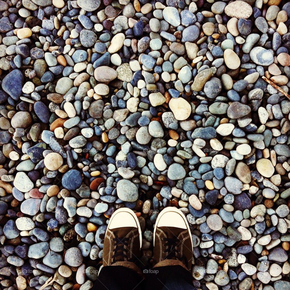 beach rocks feet standing by elundeen