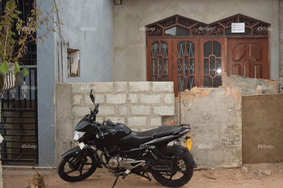 the motorcycle front of home