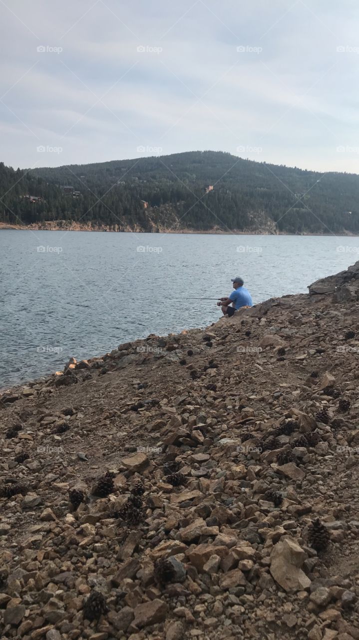 Fishing in Colorado, enjoying the peacefulness of nature.