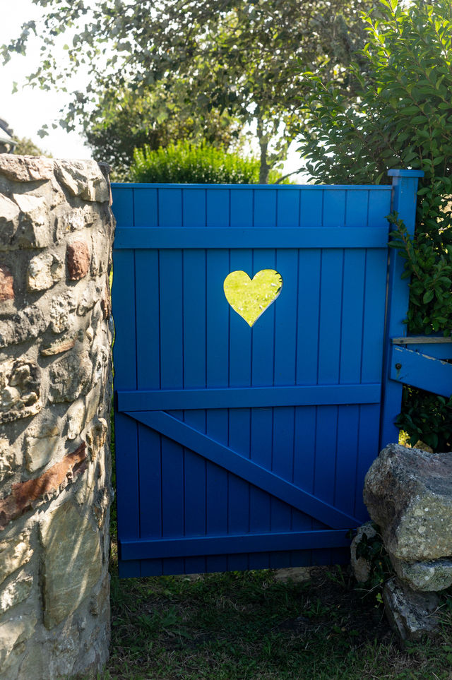 blue door with a heart