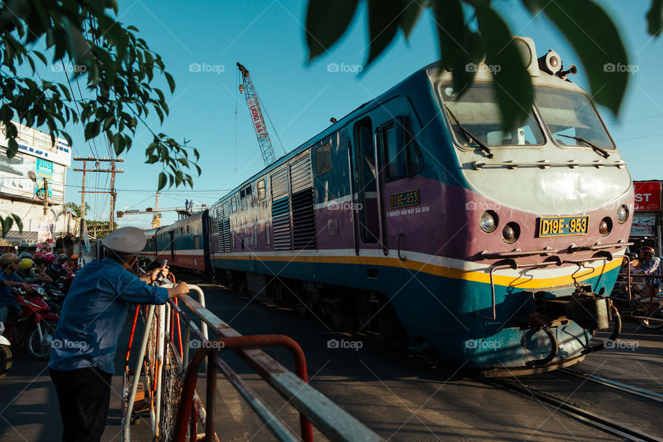 train at the railway crossing