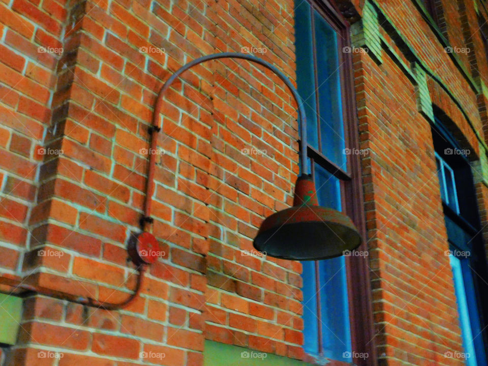 light fixture in side of old hotel
