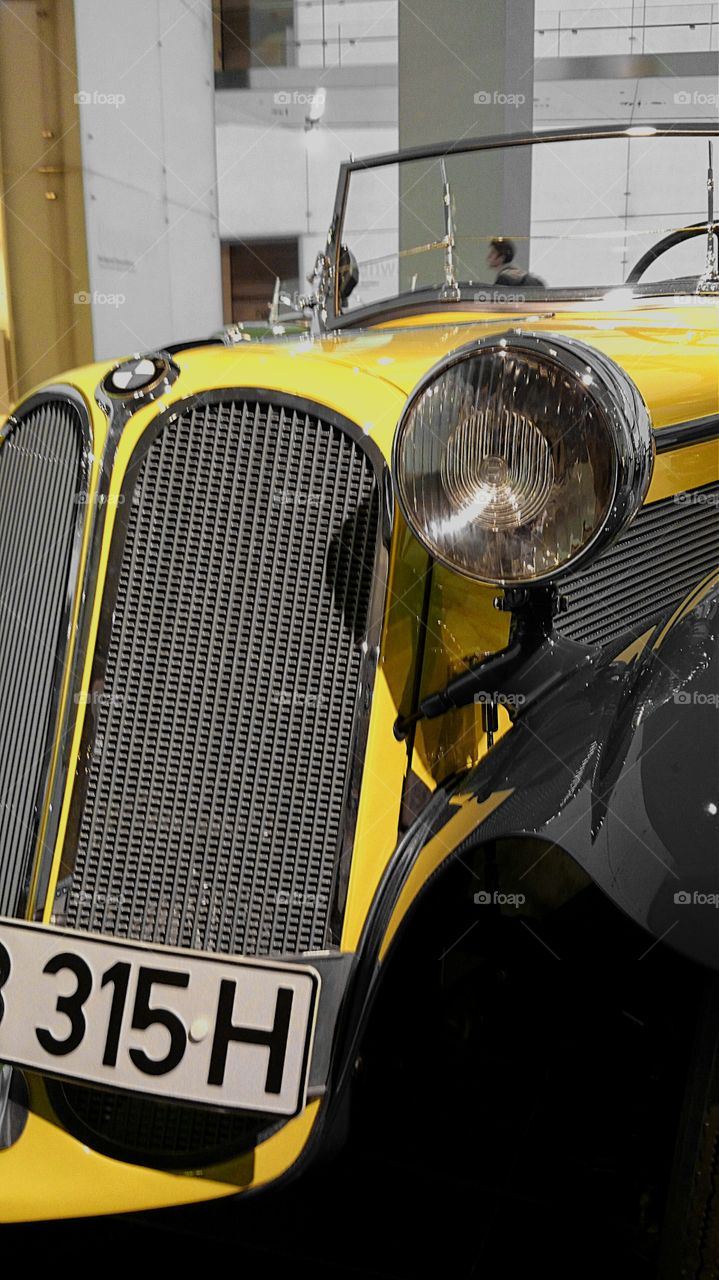 yellow car in bmw museum