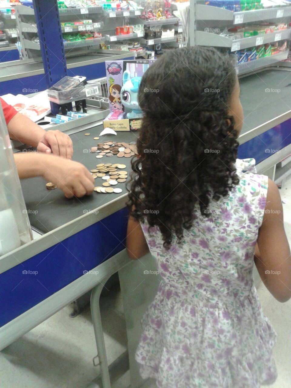 Shopping with money from piggy bank