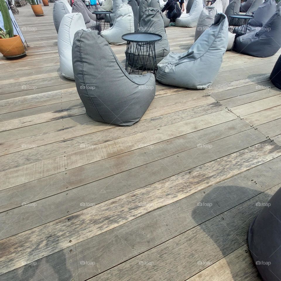 outdoor cafe table chairs in bogor with a view of geulis mountain