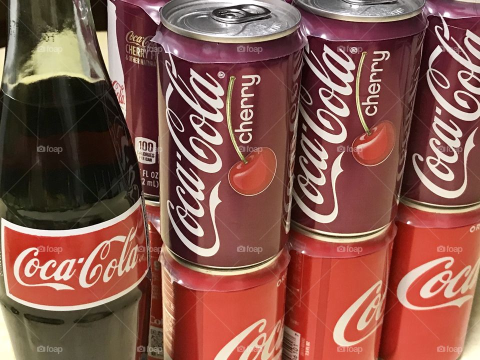 Coca Cola and cherry coke cans and bottle 