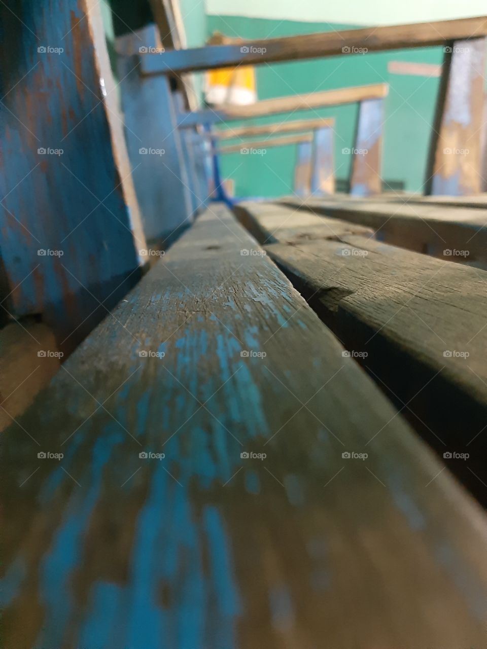 A close-up photo of texture of wooden long chair