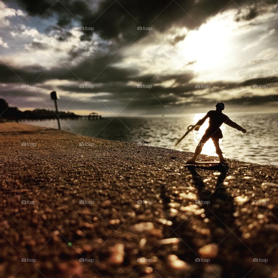 toys soldier, water, shore, sun, clouds, beautiful, light and dark