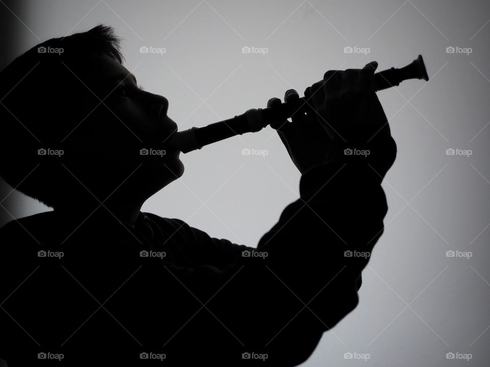 Playing instrument silhouette