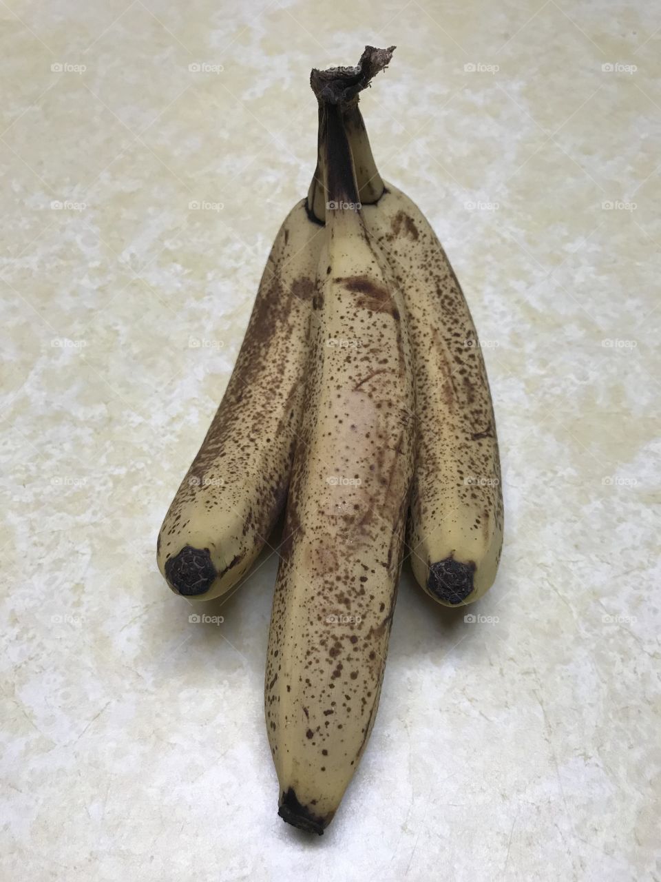 3 oddly shaped bananas