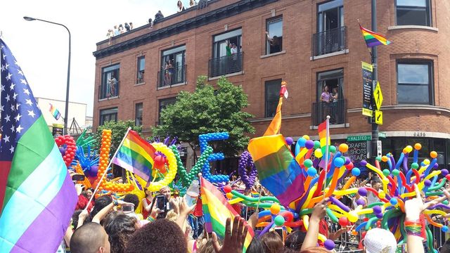 Chicago Pride Parade. Rainbow balloons with Love.