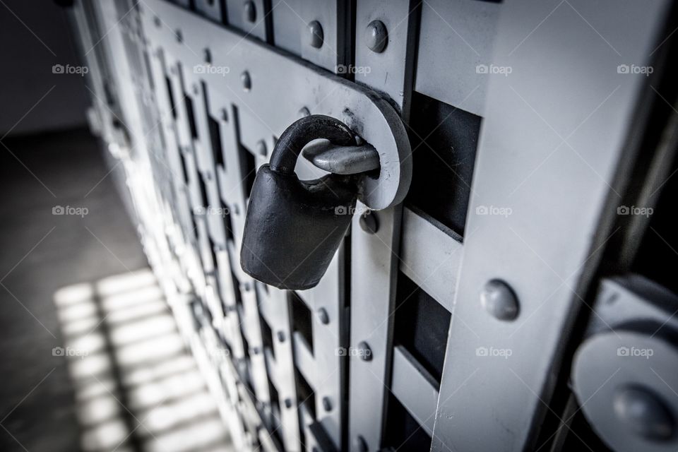 Territorial Prison Lock-Up. Cell door and lock at the Wyoming. Territorial Prison in Laramie, WY.