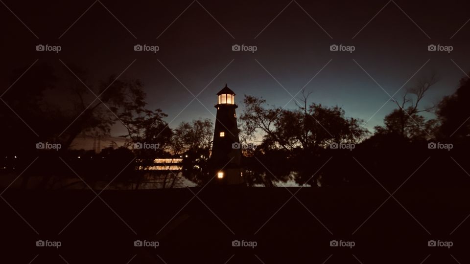 What a wonderful backlit evening with the lighthouse using whatever light is available to make evening Pictured. 