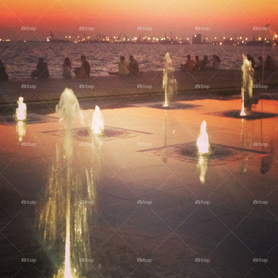 Evening pleasure. Evening walk by the sea
