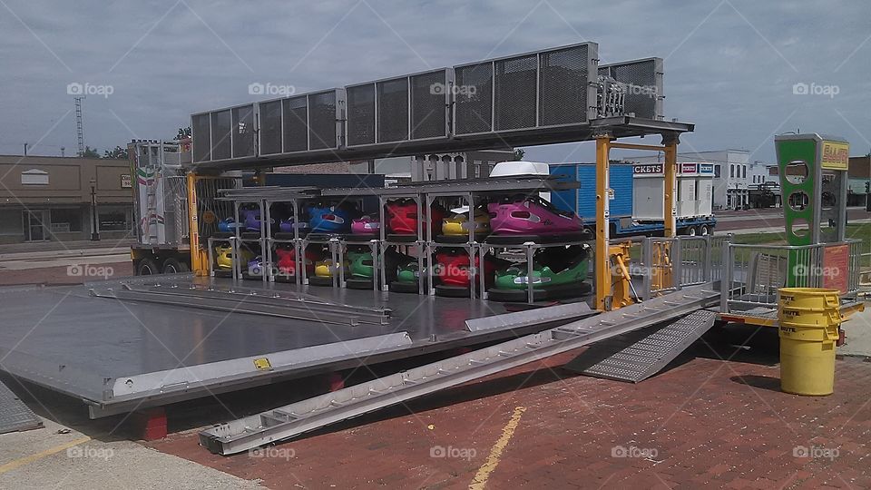 bumper cars. the carnival people were packing up and moving on