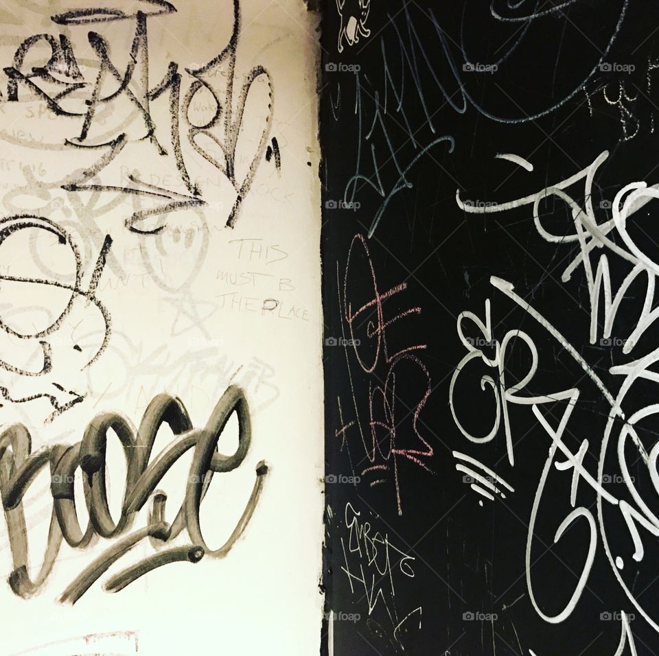 Graffiti on a black and white wall!! 