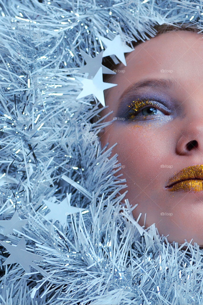 Close-up of glamour woman with tinsel