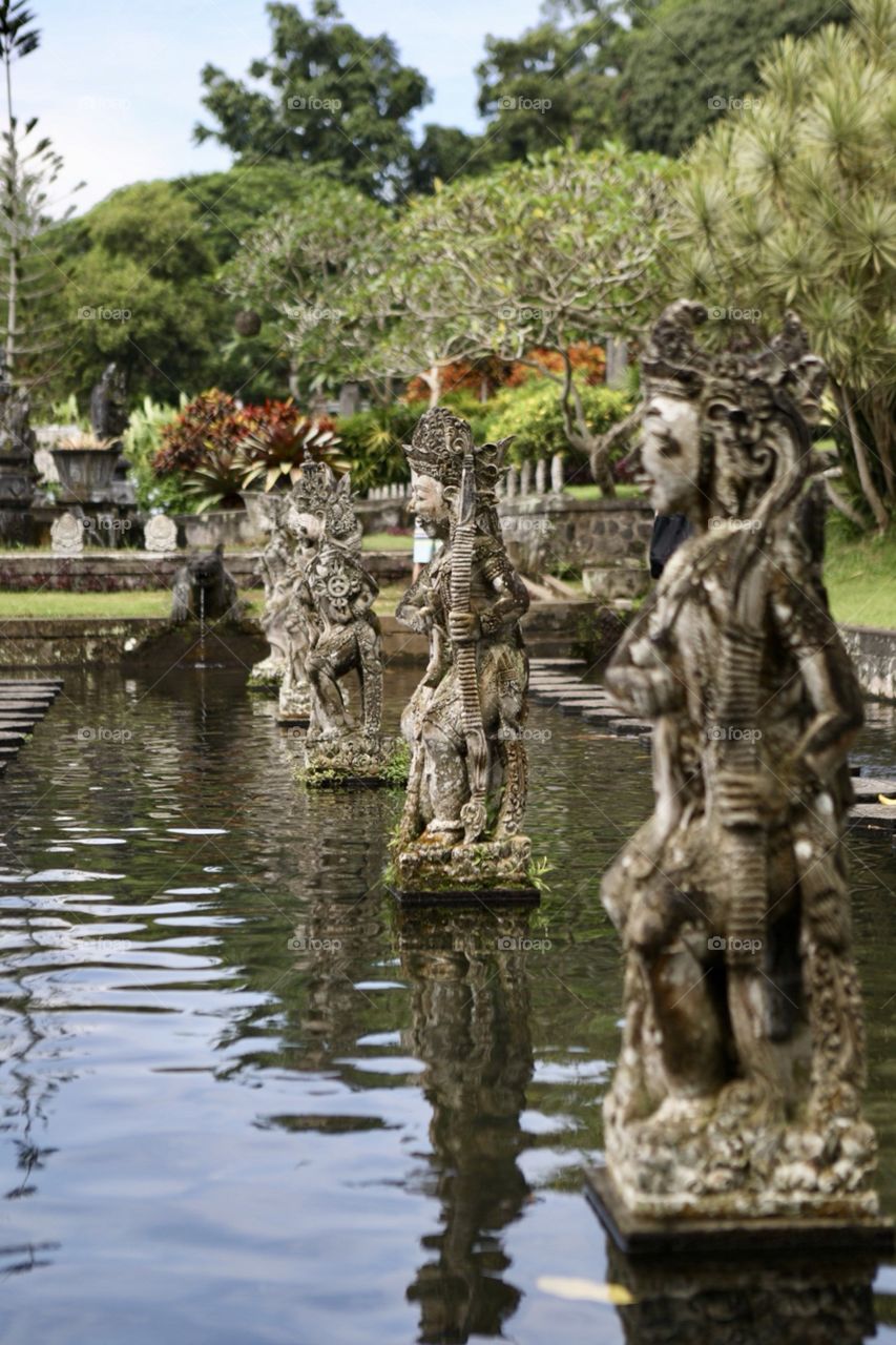 Views at a beautiful Hindu water temple in Bali, Indonesia at midday. 