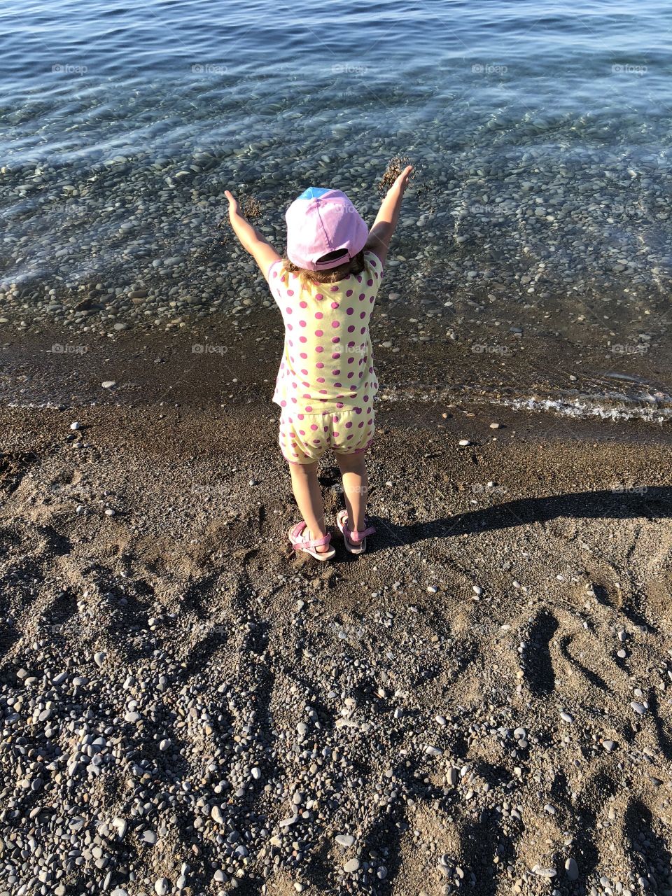Throwing Rocks And Sand Into The Lake!