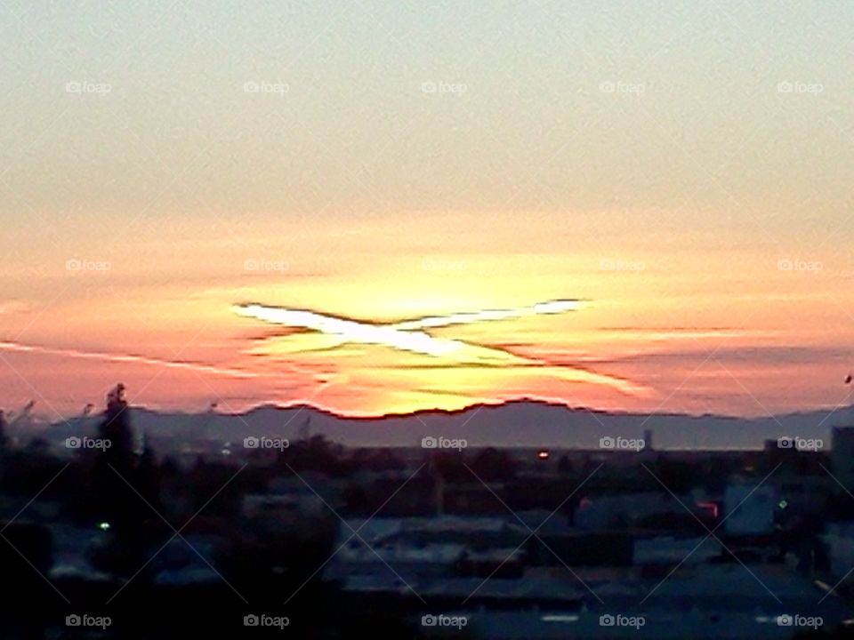 Easter skies above Oakland, Sunset cross in April